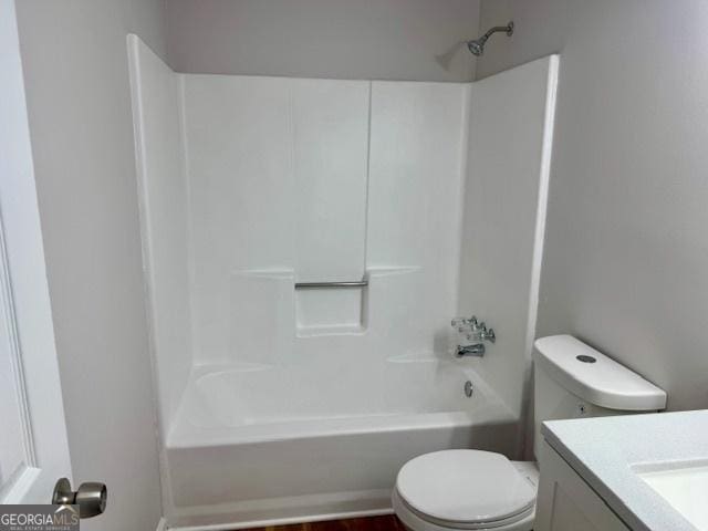 3988 Chimney Ridge Dr, Ellenwood, GA 30294 - bathroom featuring shower / bath combination, vanity, and toilet