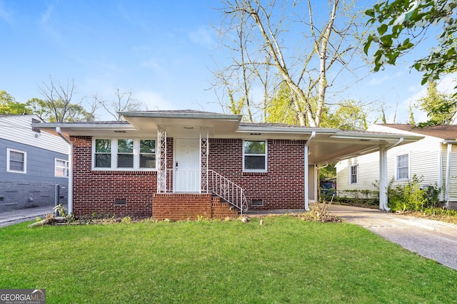 338 Mount Zion Rd, Hapeville, GA 30354 - view of front facade with driveway, brick siding, a front lawn, and crawl space