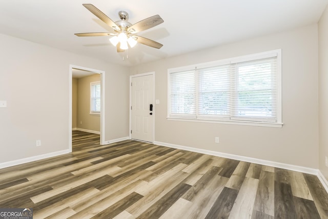 338 Mount Zion Rd, Hapeville, GA 30354 - spare room featuring baseboards, wood finished floors, and a ceiling fan