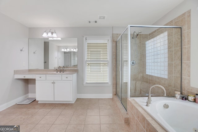 bathroom featuring tile patterned floors, baseboards, and a shower stall