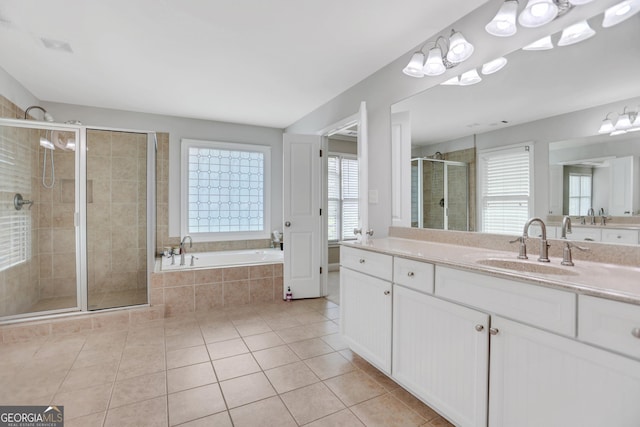 bathroom featuring a garden tub, tile patterned floors, visible vents, a shower stall, and vanity