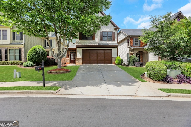 view of front facade featuring driveway, brick siding, an attached garage, stone siding, and a front lawn