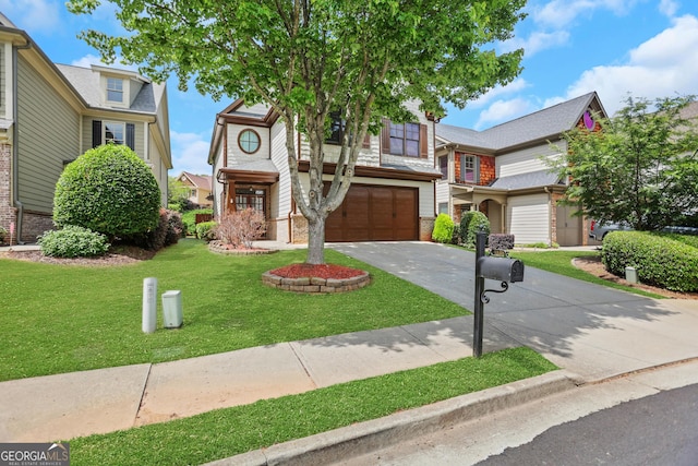 view of front facade featuring a front lawn, driveway, brick siding, and a garage