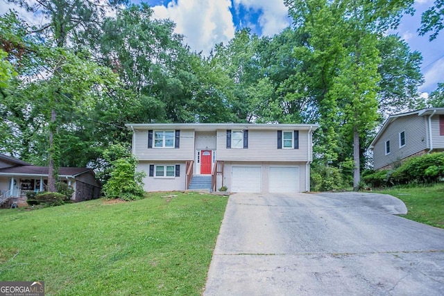 3938 Emerald Springs Ct, Decatur, GA 30035 - raised ranch featuring a front yard, a garage, and driveway