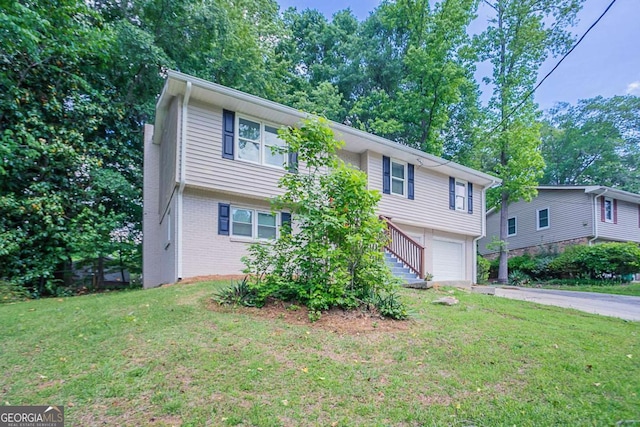 3938 Emerald Springs Ct, Decatur, GA 30035 - view of front of home with an attached garage, brick siding, driveway, and a front lawn
