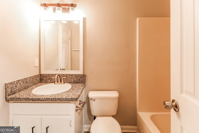 full bathroom featuring toilet and vanity