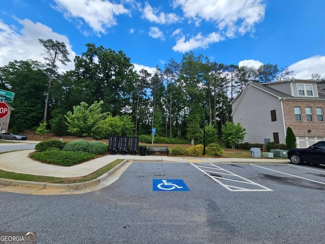 uncovered parking lot with mail area