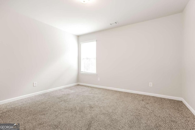 7843 Shertall St, Fairburn, GA 30213 - empty room with visible vents, baseboards, and carpet floors