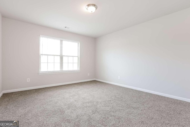 7843 Shertall St, Fairburn, GA 30213 - unfurnished room with baseboards, visible vents, and carpet