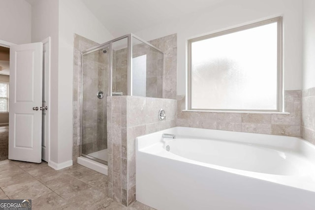 7843 Shertall St, Fairburn, GA 30213 - full bathroom featuring a garden tub and a stall shower