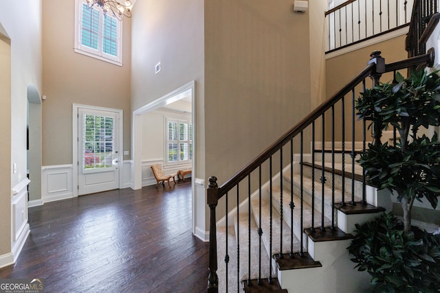 621 Oakbourne Way, Woodstock, GA 30188 - foyer with a chandelier, wood-type flooring, a high ceiling, and stairs