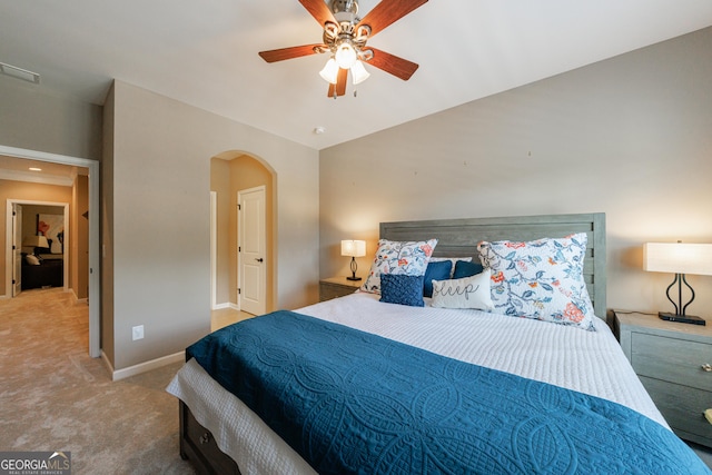 621 Oakbourne Way, Woodstock, GA 30188 - bedroom featuring arched walkways, carpet, baseboards, and ceiling fan