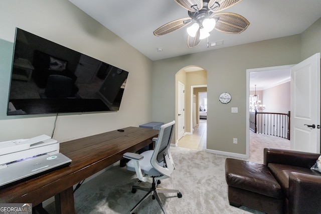621 Oakbourne Way, Woodstock, GA 30188 - office space featuring arched walkways, light carpet, a ceiling fan, baseboards, and a chandelier