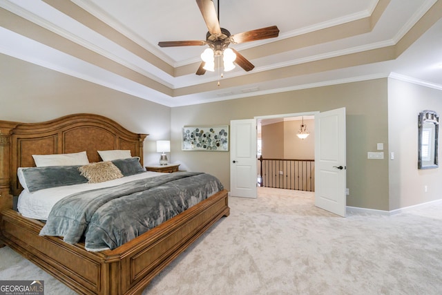 621 Oakbourne Way, Woodstock, GA 30188 - bedroom with a raised ceiling, light colored carpet, ornamental molding, ceiling fan, and baseboards