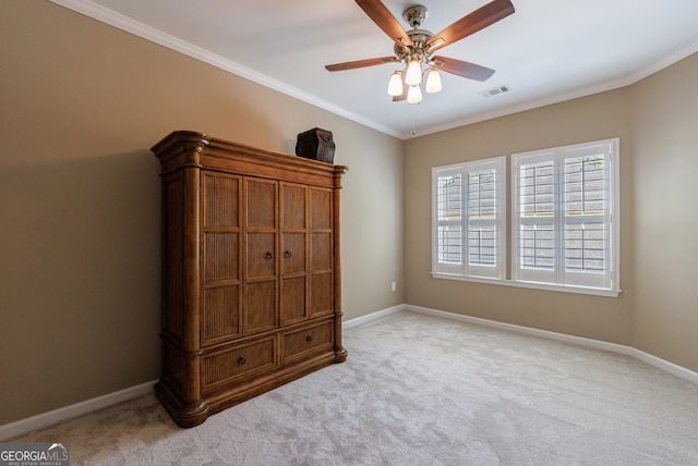 621 Oakbourne Way, Woodstock, GA 30188 - bedroom featuring light carpet, baseboards, ornamental molding, and ceiling fan