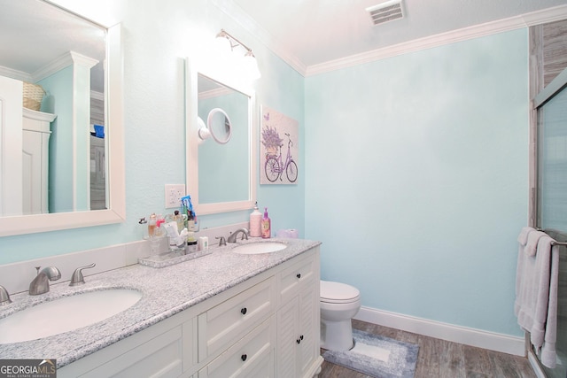 1609 Dillard Bray Rd, Royston, GA 30662 - full bathroom featuring visible vents, wood finished floors, ornamental molding, and a sink