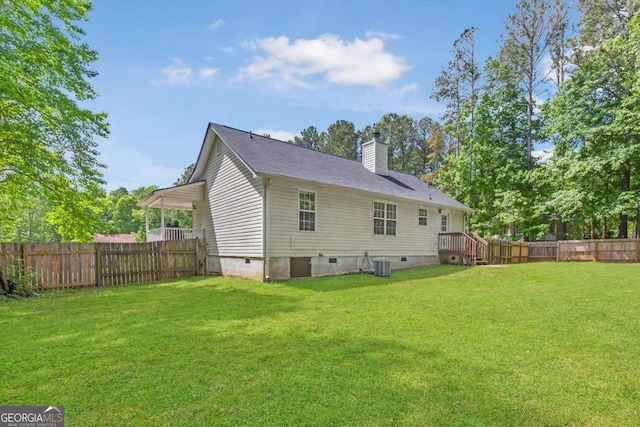 37 Winesap Ct, Temple, GA 30179 - rear view of house with crawl space, a fenced backyard, and a chimney