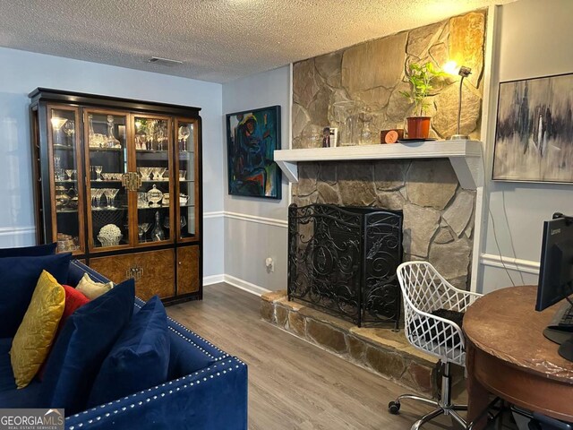6119 Woodmont Blvd, Peachtree Corners, GA 30092 - dining space with a chandelier, wood finished floors, baseboards, and a textured ceiling