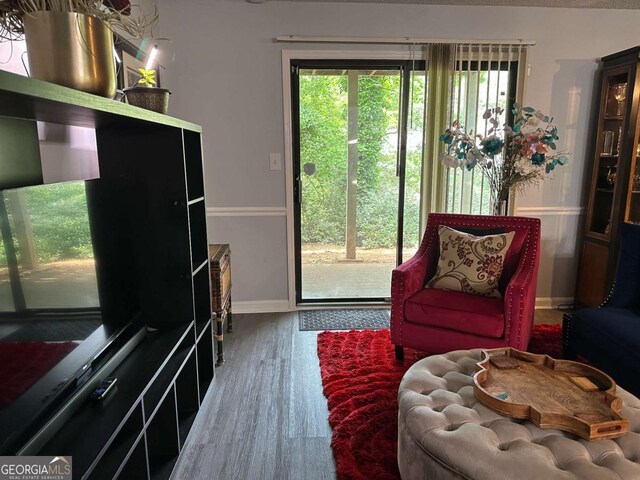 6119 Woodmont Blvd, Peachtree Corners, GA 30092 - dining area with an inviting chandelier, a textured ceiling, and wood finished floors