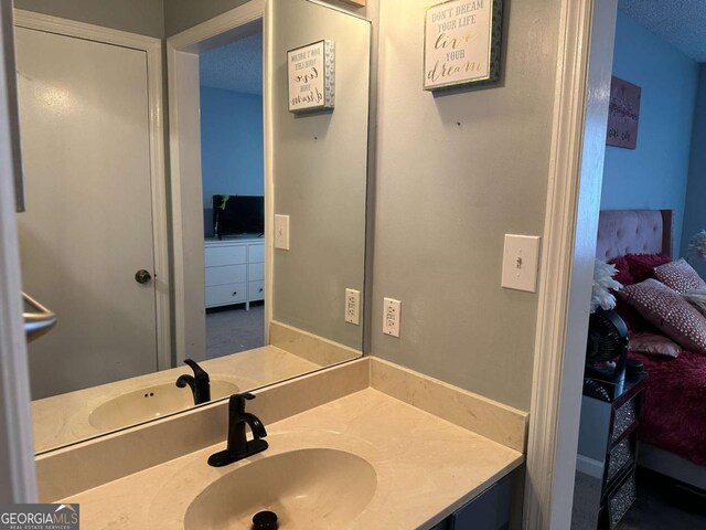 6119 Woodmont Blvd, Peachtree Corners, GA 30092 - carpeted bedroom with a textured ceiling