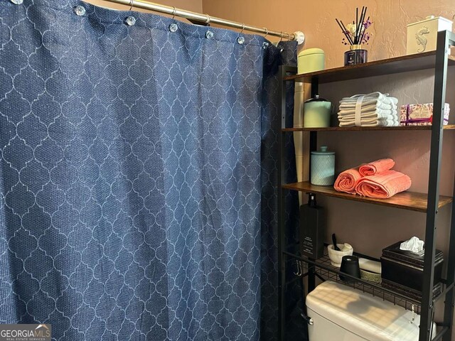 6119 Woodmont Blvd, Peachtree Corners, GA 30092 - bedroom with access to exterior and a textured ceiling