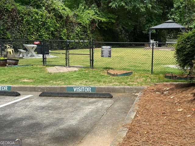 6119 Woodmont Blvd, Peachtree Corners, GA 30092 - view of property's community featuring a gazebo and a gate
