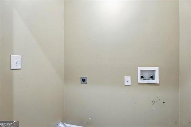 washroom with laundry area, hookup for a washing machine, and electric dryer hookup