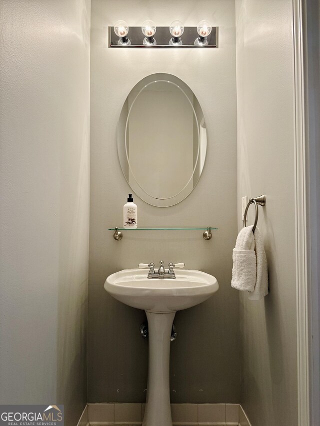 bathroom featuring tile patterned flooring
