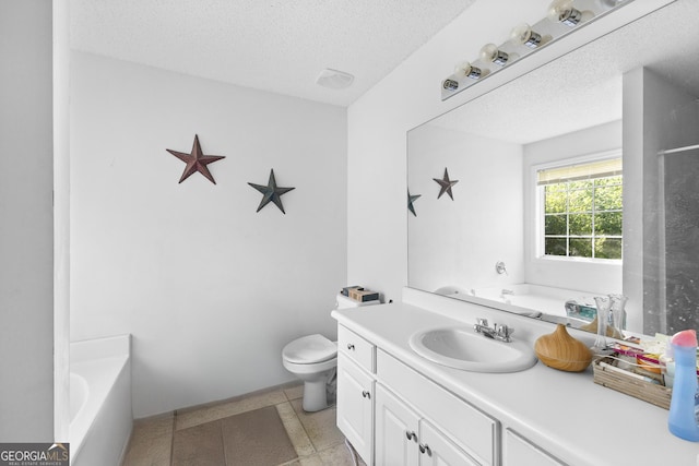 425 W Ridgeway Rd, Maysville, GA 30558 - bathroom featuring a bathtub, vanity, toilet, and a textured ceiling