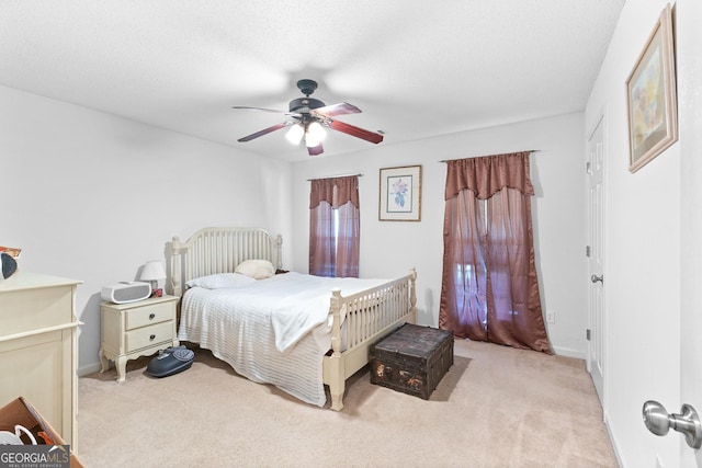 425 W Ridgeway Rd, Maysville, GA 30558 - bedroom featuring carpet floors, ceiling fan, and baseboards