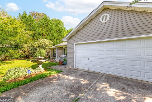 425 W Ridgeway Rd, Maysville, GA 30558 - garage featuring concrete driveway