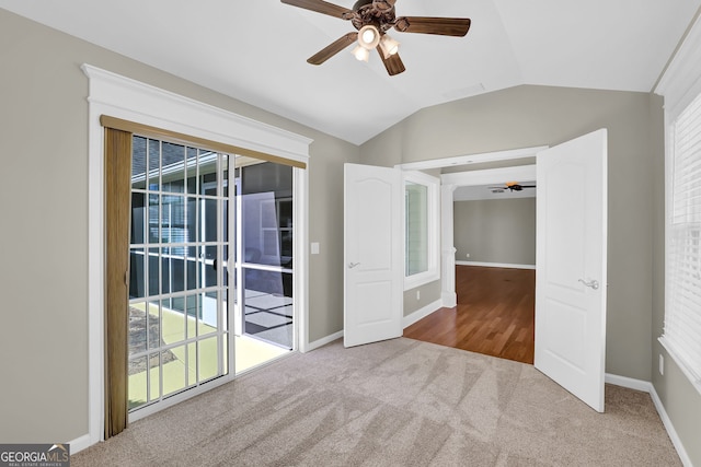 308 Jessica Way, Canton, GA 30114 - unfurnished room with ceiling fan, carpet flooring, vaulted ceiling, and healthy amount of natural light