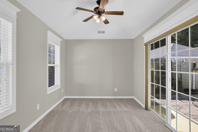 308 Jessica Way, Canton, GA 30114 - spare room featuring carpet floors, baseboards, and a ceiling fan