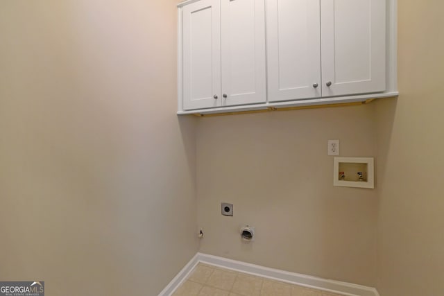 308 Jessica Way, Canton, GA 30114 - washroom featuring hookup for an electric dryer, cabinet space, washer hookup, baseboards, and light tile patterned floors