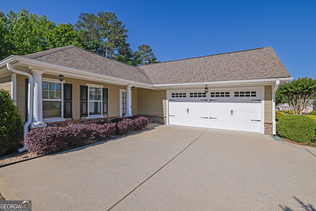 308 Jessica Way, Canton, GA 30114 - ranch-style home with a garage, concrete driveway, a shingled roof, and stone siding