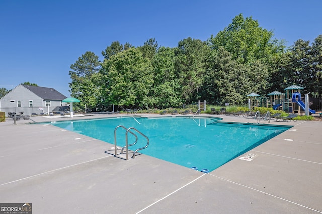 308 Jessica Way, Canton, GA 30114 - community pool with a patio area and view of scattered trees