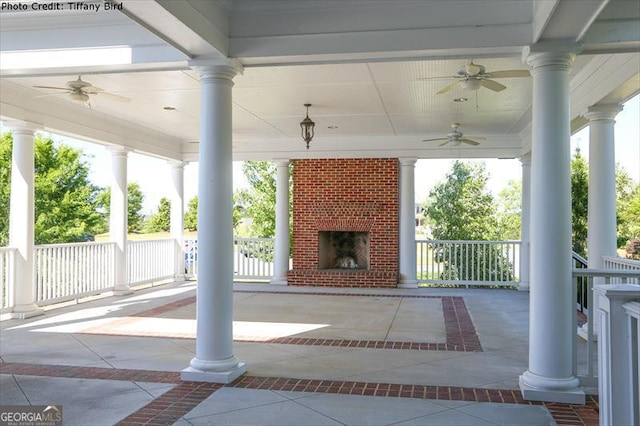 308 Jessica Way, Canton, GA 30114 - view of patio with an outdoor brick fireplace and a ceiling fan