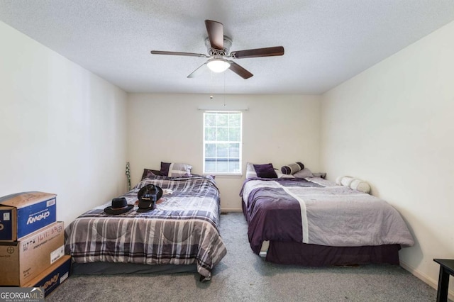 40 Carole Dr, Carrollton, GA 30117 - carpeted bedroom featuring ceiling fan and a textured ceiling
