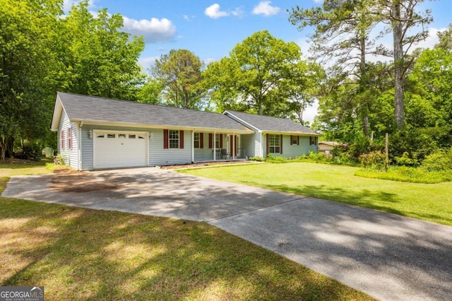 40 Carole Dr, Carrollton, GA 30117 - ranch-style home featuring driveway, a porch, a garage, and a front yard
