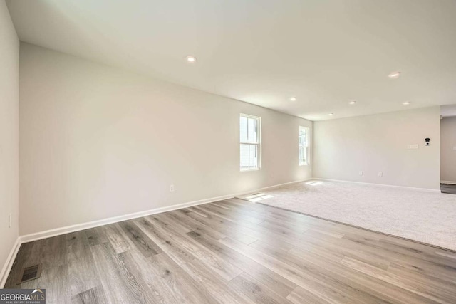 8491 Limerick Ln, Winston, GA 30187 - empty room with recessed lighting, baseboards, visible vents, and wood finished floors
