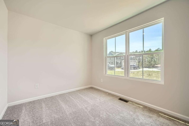 8491 Limerick Ln, Winston, GA 30187 - unfurnished room featuring visible vents, baseboards, and carpet floors
