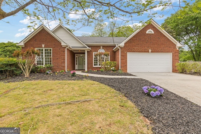 ranch-style house featuring an attached garage, brick siding, driveway, and a front lawn