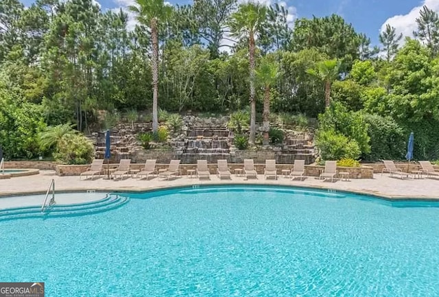 pool featuring a patio