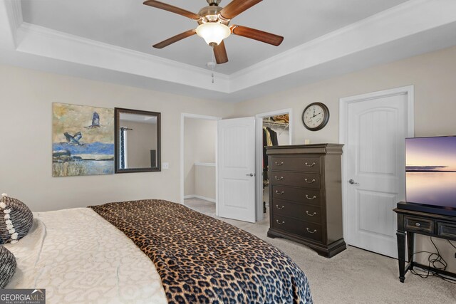 47 Reese Way, Savannah, GA 31419 - bedroom featuring a tray ceiling, a ceiling fan, ornamental molding, and light colored carpet