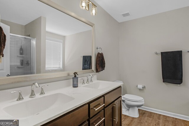 47 Reese Way, Savannah, GA 31419 - full bathroom featuring a shower stall, visible vents, a sink, and wood finished floors