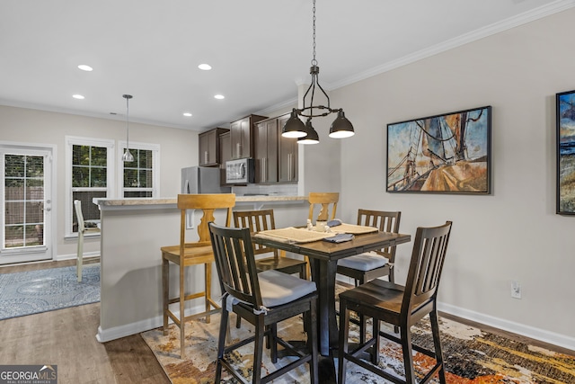 47 Reese Way, Savannah, GA 31419 - dining room featuring crown molding, recessed lighting, baseboards, and wood finished floors