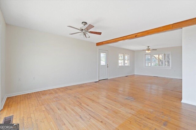 863 Hickory Bluff Rd, Waverly, GA 31565 - empty room featuring light wood finished floors, visible vents, and ceiling fan