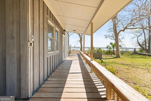 863 Hickory Bluff Rd, Waverly, GA 31565 - wooden terrace featuring a lawn