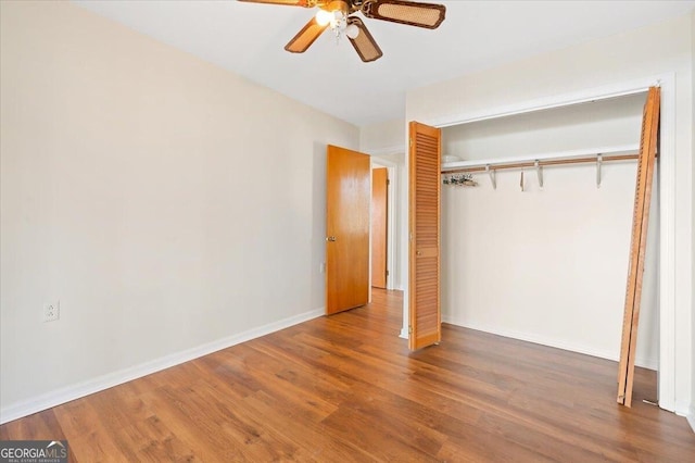 863 Hickory Bluff Rd, Waverly, GA 31565 - unfurnished bedroom featuring baseboards, a closet, and wood finished floors