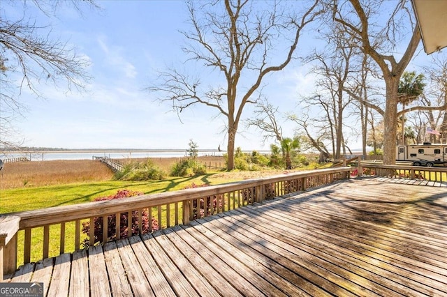 863 Hickory Bluff Rd, Waverly, GA 31565 - wooden deck with a water view and a lawn
